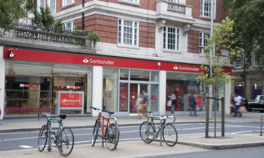A Santander Bank in the U.K. with bicycles parked in front