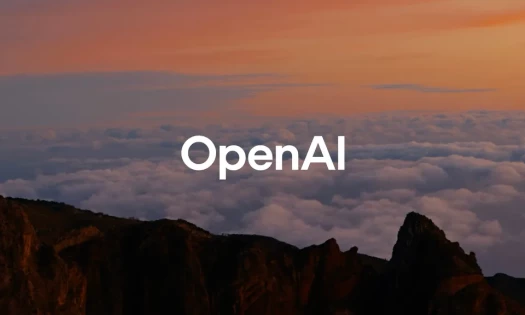 OpenAI brand asset over a mountainous backdrop at dusk
