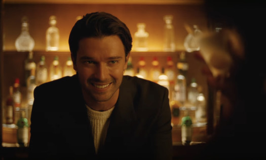 Patrick Schwarzenegger by the bar