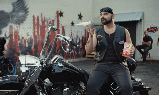 A biker enjoys Tic Tac Chewy!