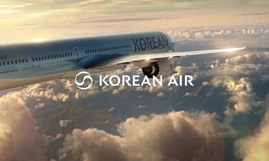 A Korean Air plane soaring through the clouds