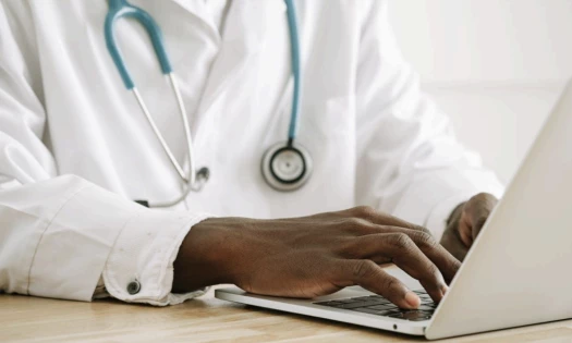 Doctor on his laptop