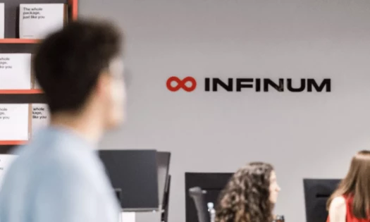 Man looking at Infinum logo