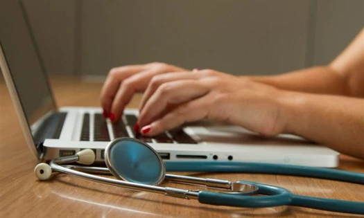 Doctor on her laptop