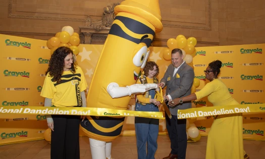 Ribbon-cutting event at Crayola's National Dandelion Day celebration