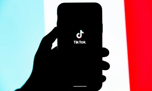 Phone with TikTok graphics