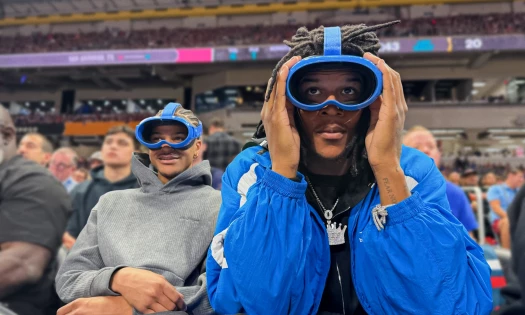 The O'Neal brothers wearing Priceline's AR goggles during an NCAA game