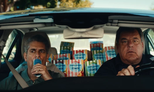 Michael Imperioli and Steve Schirripa in a car with Ciao! boxes in the passenger seat