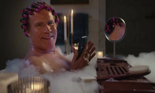 Will Ferrell in the bathtub holding his phone