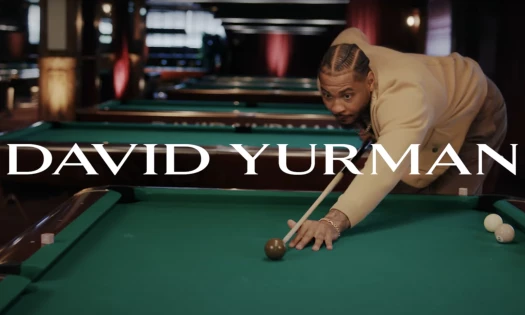 Carmelo Anthony playing billiards with David Yurman logo