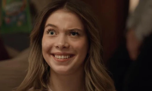 A teen funnily twitching her face in Skittles' new ad