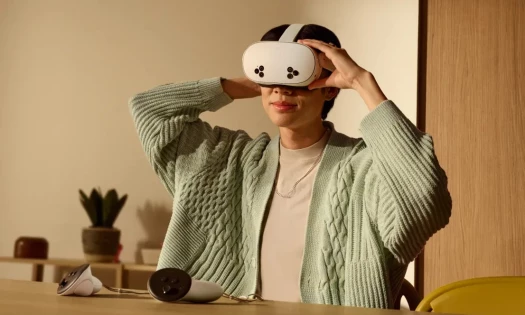 A woman wearing a Meta Quest headset