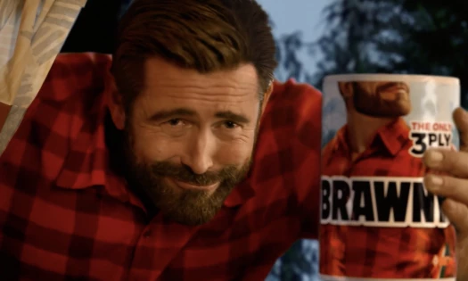 The "Brawny Man" holding a three-ply tissue roll