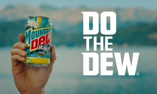 Hand holding the new Mountain Dew can with the tagline: DO THE DEW