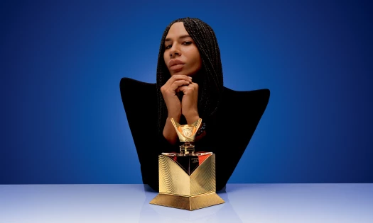 Olivier Rousteing with the bottle