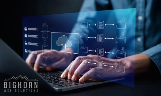 A man typing on a laptop; a cloud integration graph
