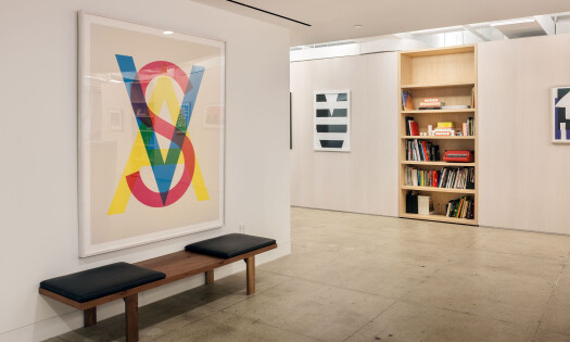 The VSA Partners logo framed in an office hallway