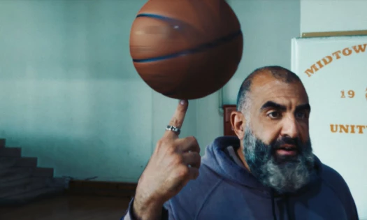 George Papoutsis spinning a basketball on his finger