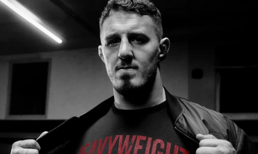 Tom Aspinall rocking the new "Heavyweight Collection" from Champion