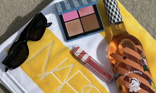 The Wölffer Estate x NARS Summer Rosé laid alongside NARS make-up products