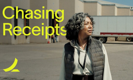 An elderly woman chasing after her coworker