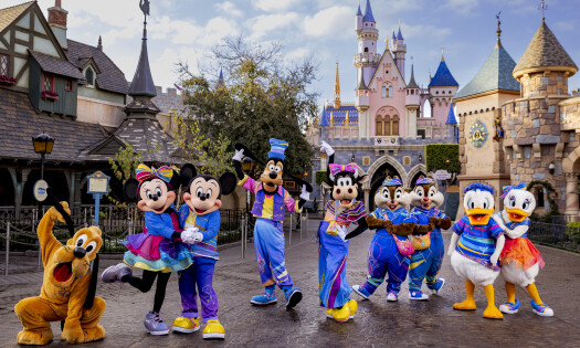 Iconic Disney characters Pluto, Minnie and Mickey Mouse, Goofy, Clarabelle Cow, Chip & Dale, Donald and Daisy Duck pose at Disneyland Resort