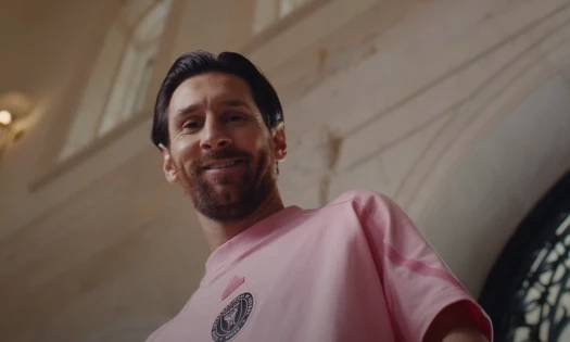 Lionel Messi smiling at the camera