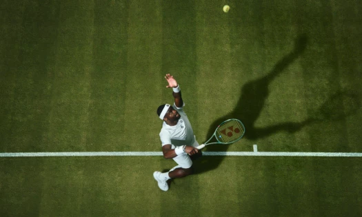 Frances Tiafoe getting ready for a serve