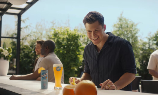 Colin Jost Laughs with Orange & Son in Blue Moon Ad