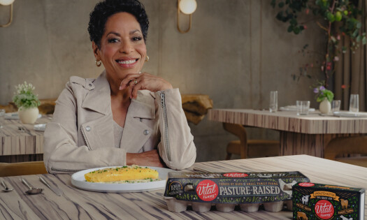 Liza Colón-Zayas posing with her omelette made with Vital Farms eggs