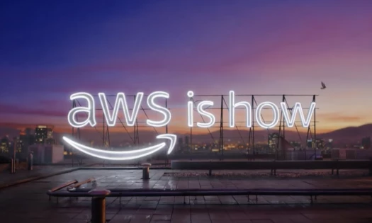 A bright billboard spelling out 'AWS is how'