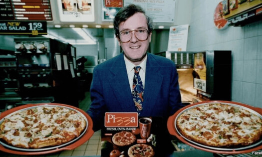 A man showcasing the McPizza in the '90s