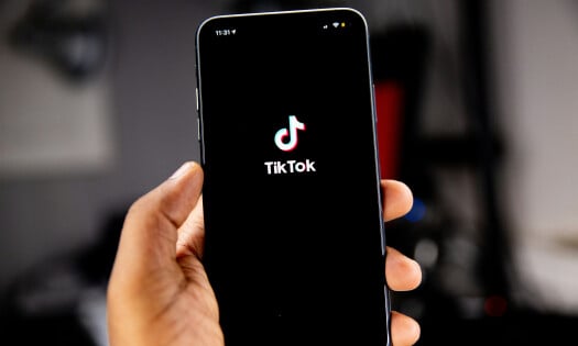 The TikTok mobile app loading on someone's phone