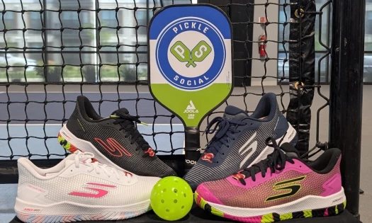 Skechers sneakers together with a Pickle and Social paddle