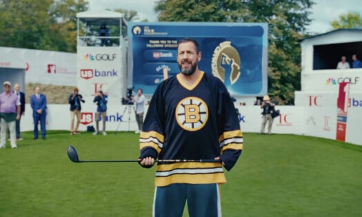 Adam Sandler holding a golf club in "Happy Gilmore 2"