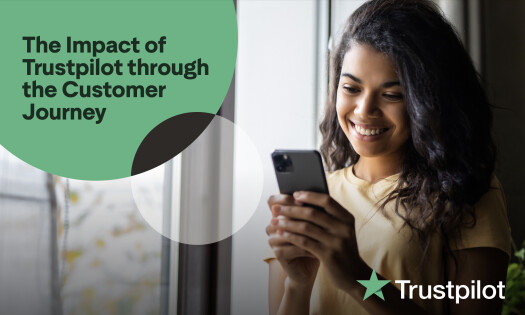 A woman using her phone with graphics of velocity home reviews that Trustpilot used as a test