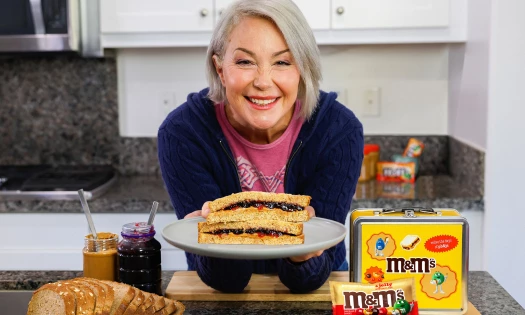 Kim Rhodes in the kitchen with the new M&M’s Peanut Butter & Jelly flavor