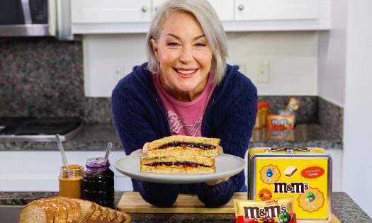 Kim Rhodes in the kitchen with the new M&M’s Peanut Butter & Jelly flavor