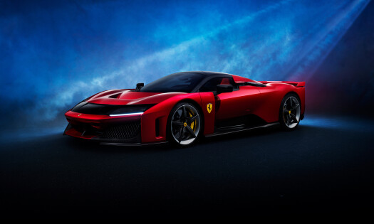 The Ferrari F80 in red against a blue backdrop