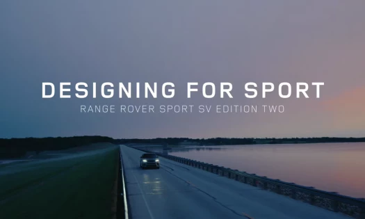 The Range Rover Sport SV driving by a scenic seaside