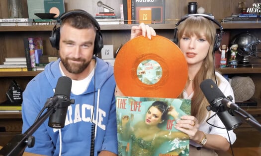 Travis Kelce and Taylor Swift showing off her new orange album on the New Heights podcast with Jason Kelce