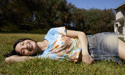A woman wearing a piece from the new Pacsun x McDonald's 'McDonaldland' collection