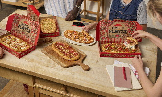 A group of friends gather around the table to feast on the new 'Crafted Flatzz'