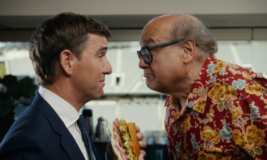 Danny DeVito and Eli Manning face off