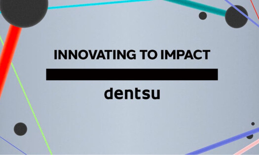 The dentsu logo with text above: INNOVATING TO IMPACT
