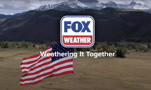 FOX Weather's new logo against an American flag with tagline: "Weathering It Together"