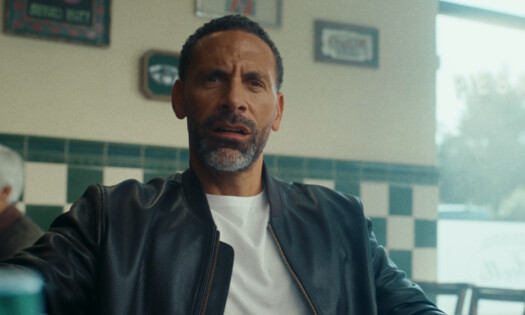 Rio Ferdinand sitting down