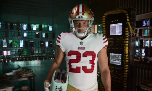 Christian McCaffrey facing the audience in his football attire