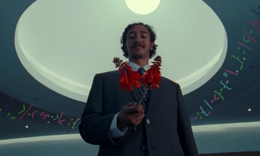 A man holding flowers