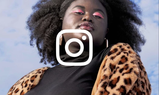 An African American woman with bright makeup against a blue sky with Instagram logo superimposed